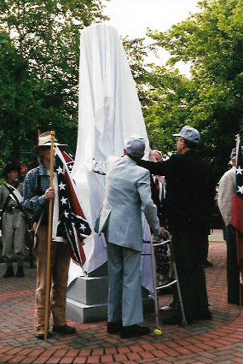 Mill worker descendant, George Kendley assists with the unveiling, July 2000.